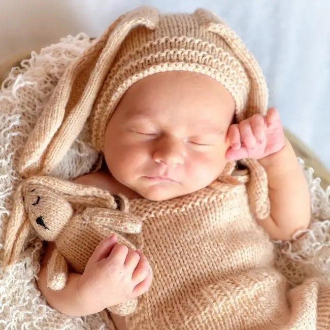 sleeping baby with hands exposed