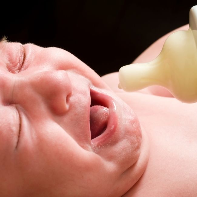 baby crying during bottle feeding