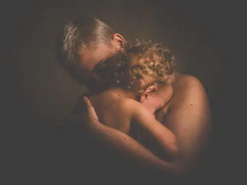 toddler hugging parent