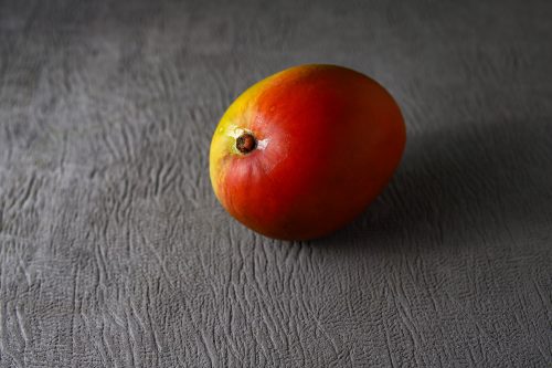 red mango on black leather textile