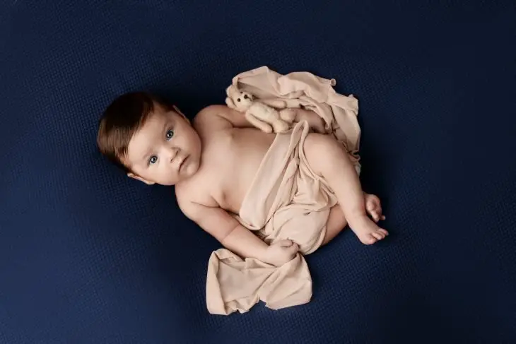 baby against blue background