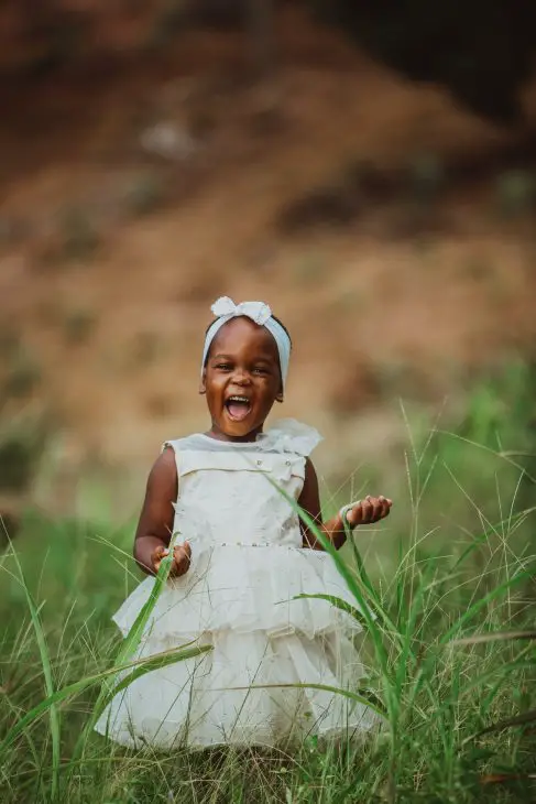 cute toddler in white dress