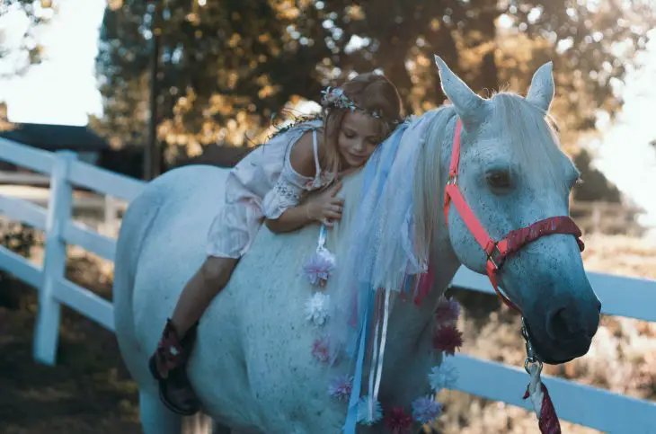 whimsical girl on a horse