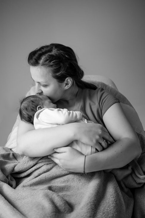 woman and breastfed baby