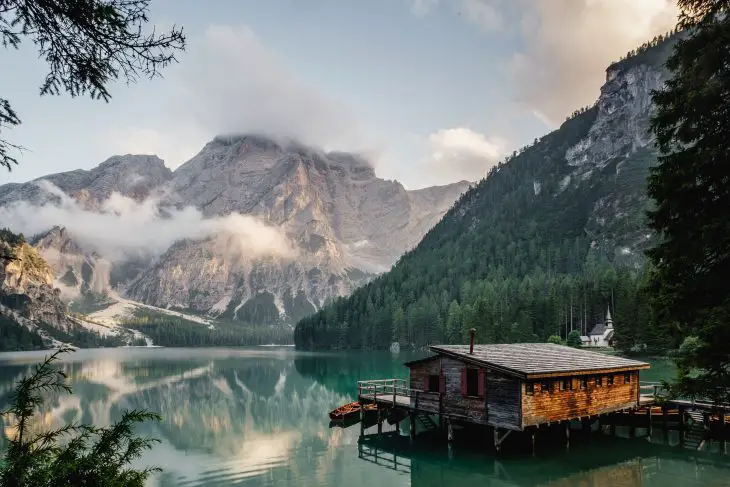 Boathouse on a mountain lake for baby shower
