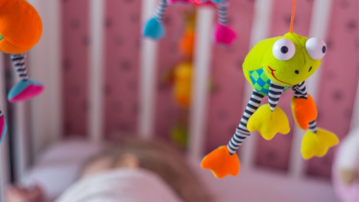 how to hang a mobile over crib